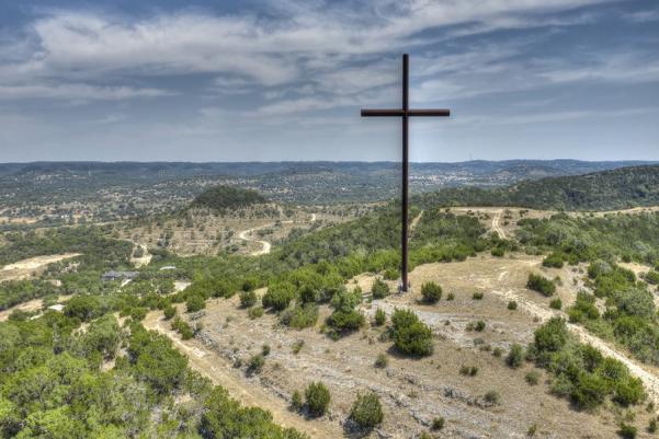 Chances are if you have traveled down Highway 16 from Pipe Creek towards San Antonio, or Highway 46 to Boerne, you’ve noticed a tall mountain topped with a simple cross emerging from its pinnacle.